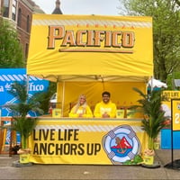 10x10 MONARCHSTOREFRONT Tent With Counters & 8x10 Media Wall