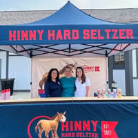 Hinny hard seltzer blonde wood counter 10x10 Monarchtent Sampling-1