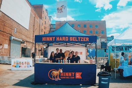 Hinny hard seltzer blonde wood counter 10x10 Monarchtent1