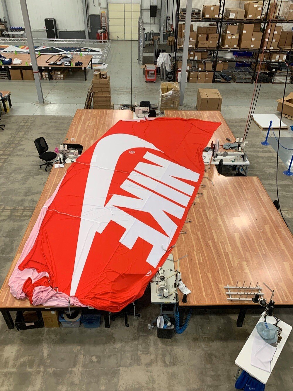 experiential retail structures Nike shoebox