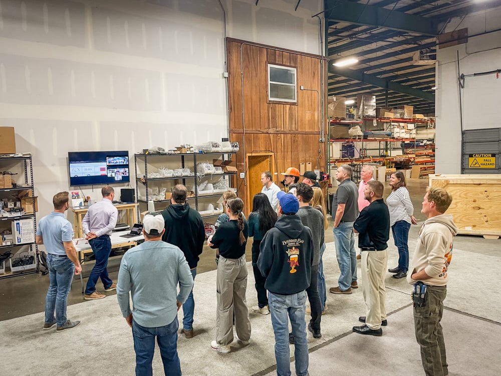 World Class Employees join a TentCraft morning huddle remotely from Iowa