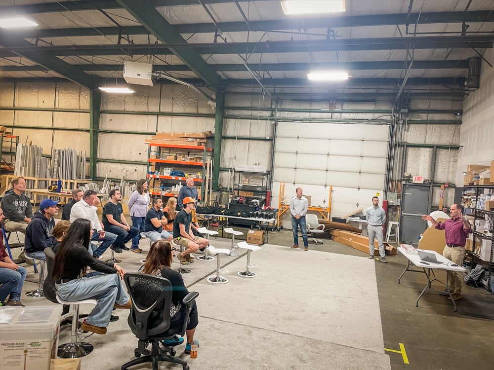 World Class Employees join a TentCraft morning huddle remotely from Iowa