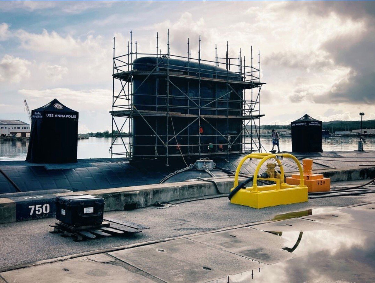USS Annapolis Submarine with 5x5 MONARCHTENTs covering their hatches at dock