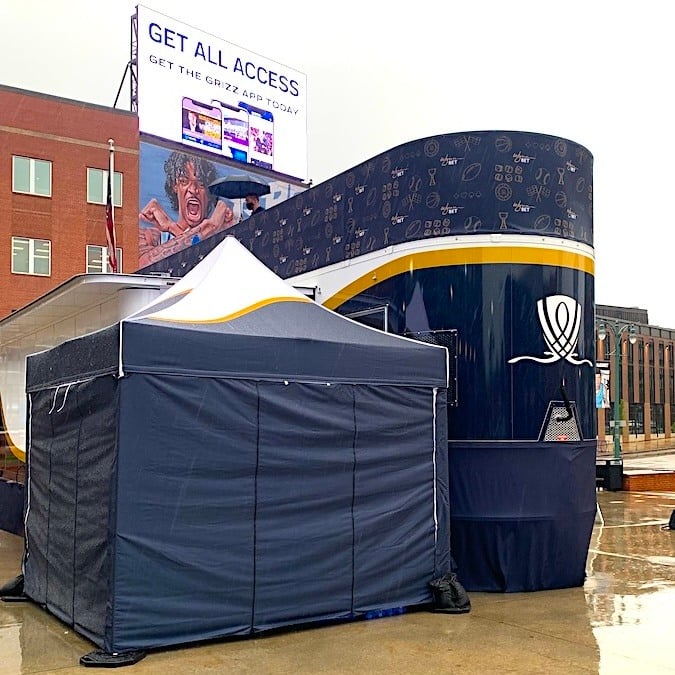 A custom 10x10 MONARCHTENT in the rain