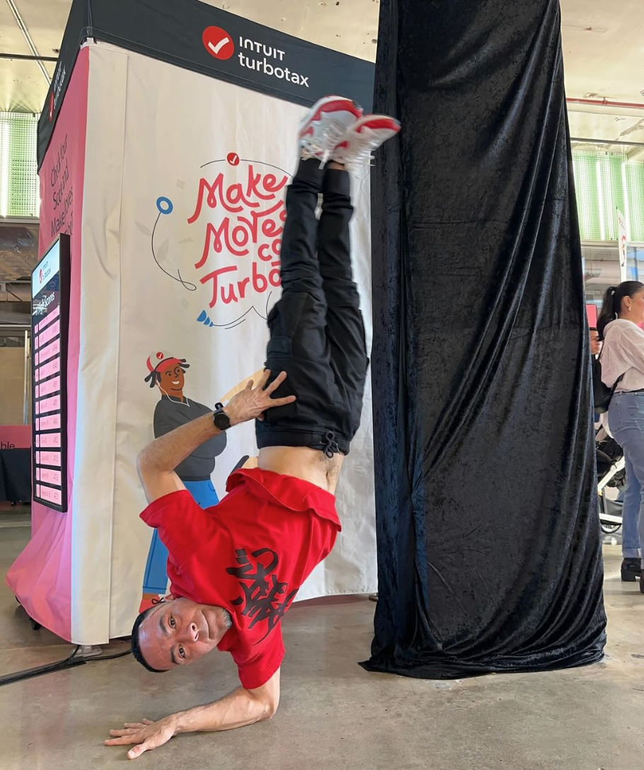 A custom 5x5 heavy-duty tent with break dancer in front of it