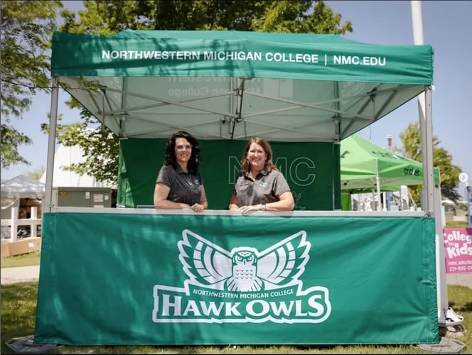 Green MONARCHTENT with Northwestern Michigan University branding