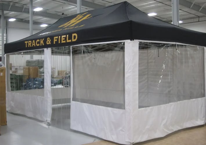 Track and Field 10x20 Monarch pop-up tent with full walls