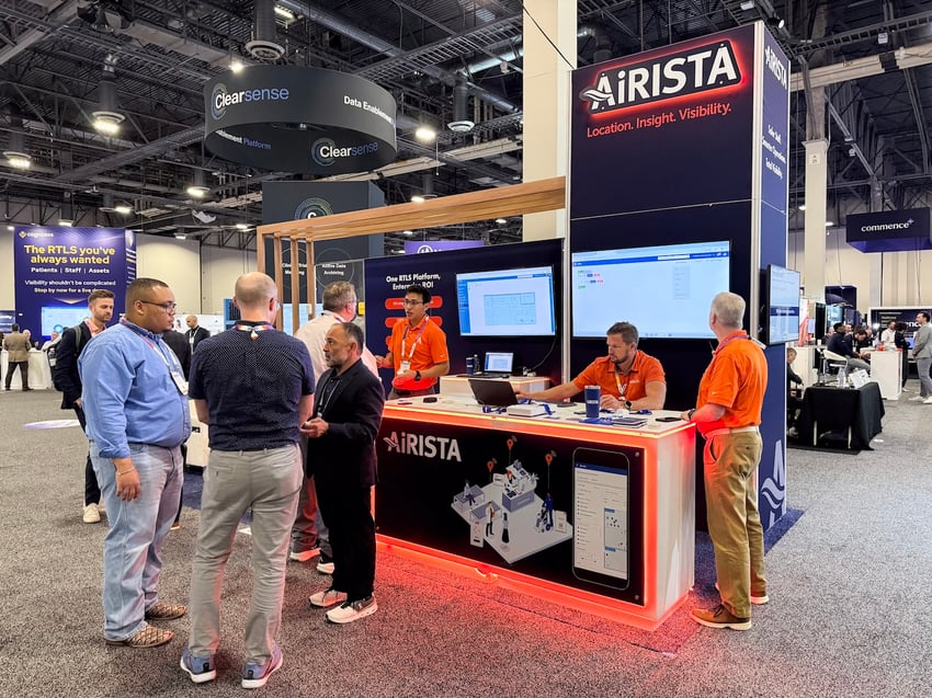 Custom Trade Show Booth With Product Display Screens and Built-In Branded Lighting by World Class Displays