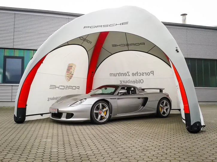 Porsche Inflatable Gybe Tent With A Car Underneath