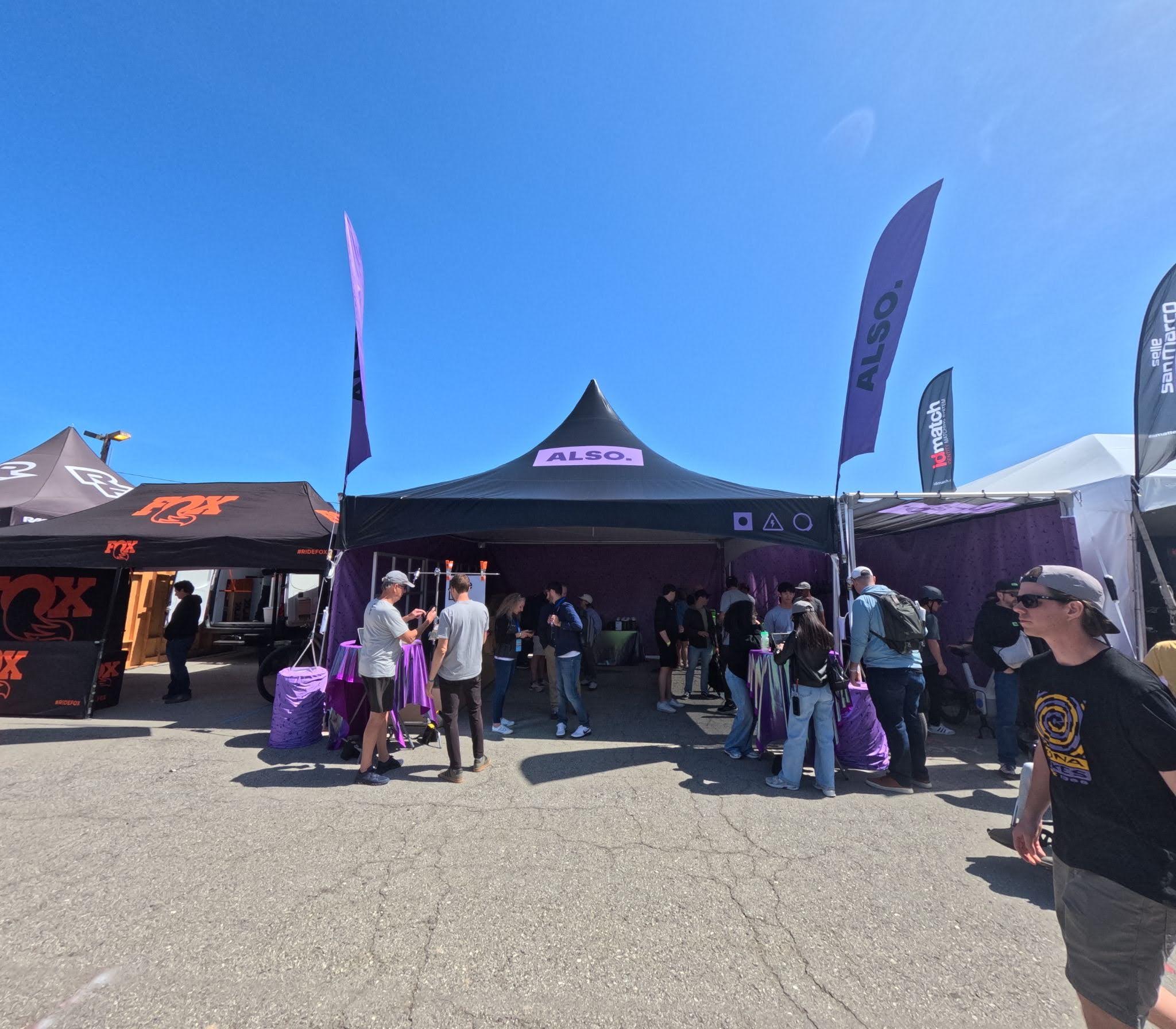 ALSO E-Series Frame Tent Cycling Activation with a Custom Sun Awning Attached