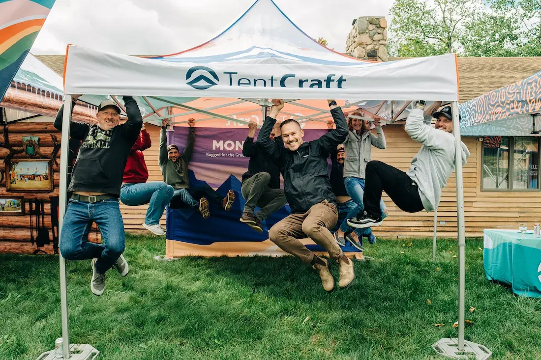 MONARCHTENT isn't a backyard canopy tent. It's heavy duty enough to support eight adults dangling from its scissor elements!