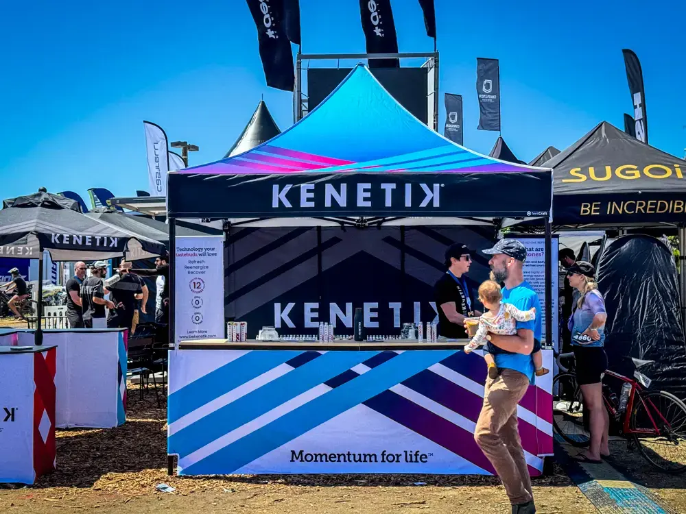 Custom 10x10 pop-up canopy tent for a beverage brand at an outdoor trade show