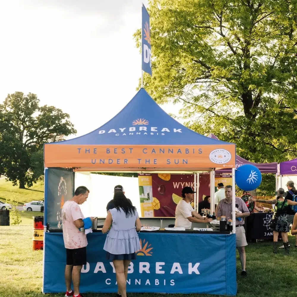 Custom 10x10 pop-up canopy tent for a beverage brand at an outdoor trade show