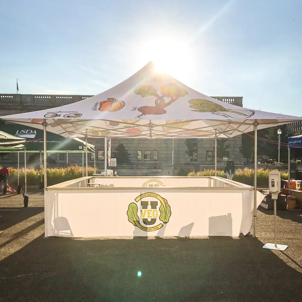 Custom farmers market tent with vegetable graphics for the USDA at the National Mall
