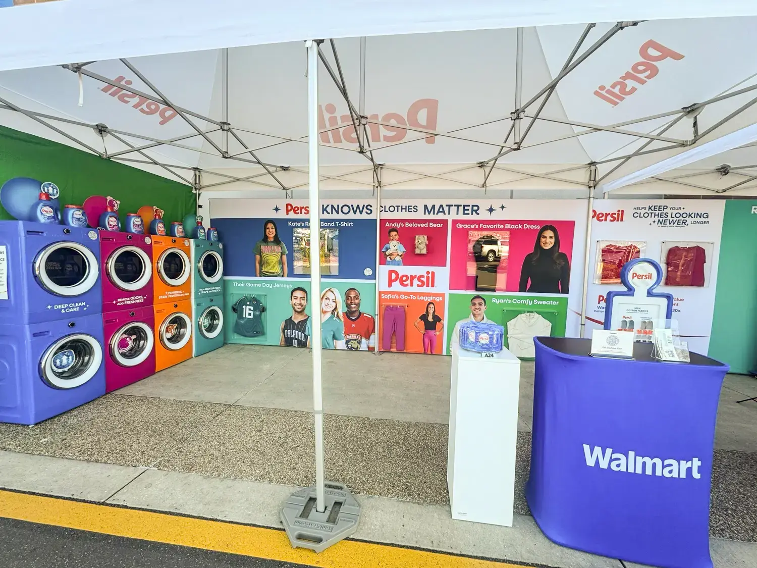 Colorful laundry machines inside the Persil MONARCHTENT Activation